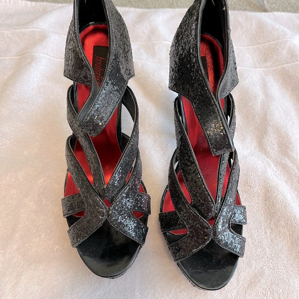 Fredricks of Hollywood black, silver pumps, 5 inch heel.